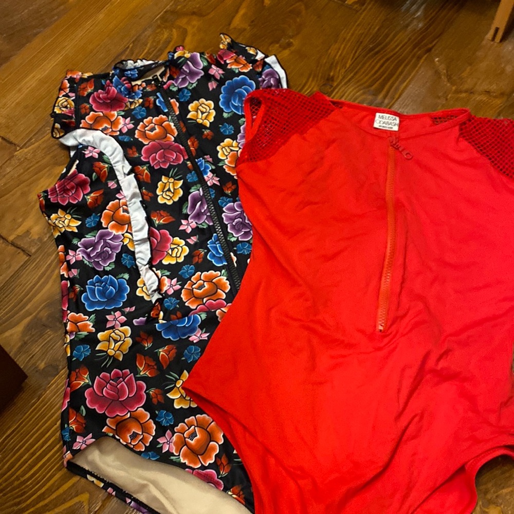 Two large sun protected suits. Zipper in front for full sun protection